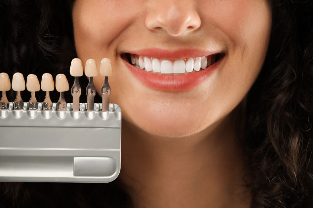 a woman is getting dental treatment.